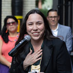 Grand Chief Savanna McGregor speaking into a microphone.